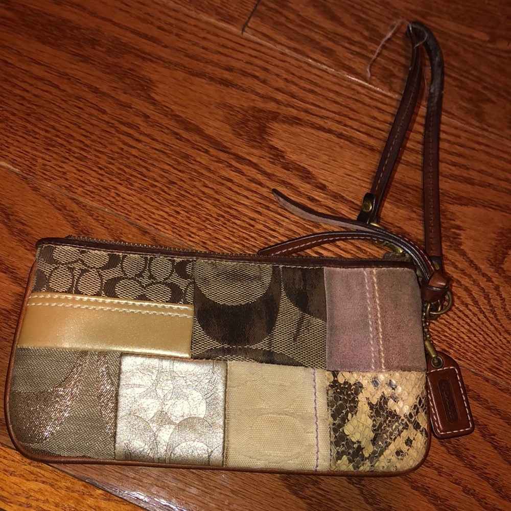 Coach wristlet. Fits smaller iphones!